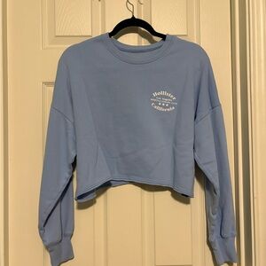 Hollister Light Blue Cropped Sweatshirt with White Print